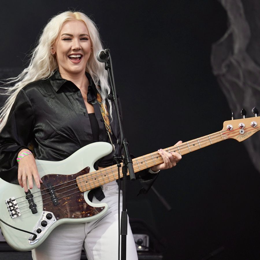Kate Lloys playing bass on the Millennium Square stage