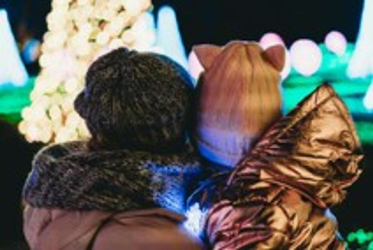 Visitors surrounded by light and sound artwork