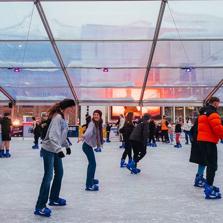 People ice skating on Millennium Square
