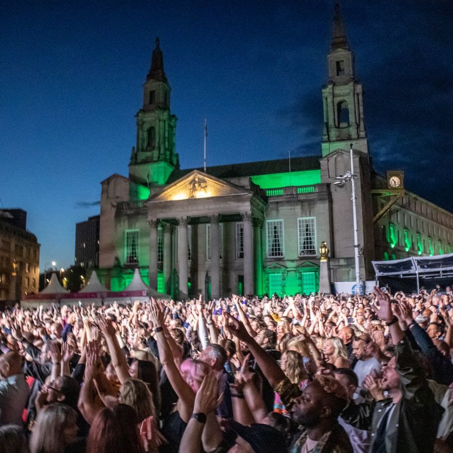 Crowd enjoying a live event at a Millennium Square summer gig