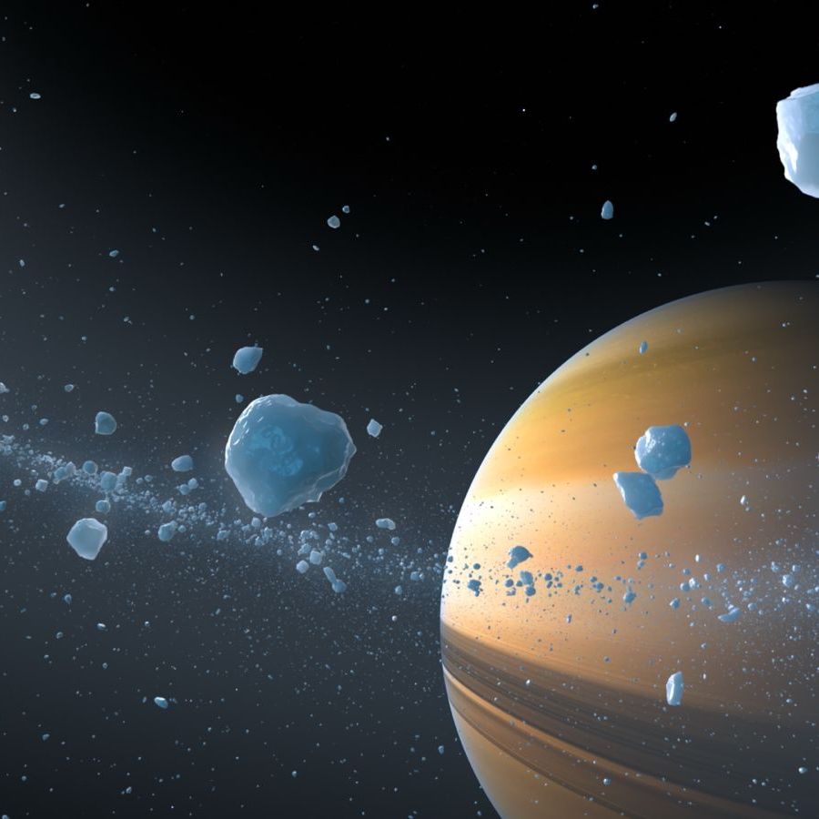 Ringed gas giant surrounded by an asteroid field, with chunks of ice and rock scattered across outer space.