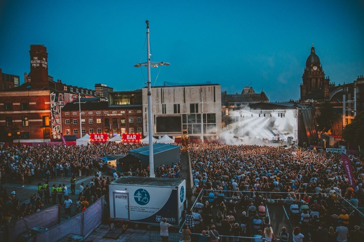 Mobile Changing Places toilet and accessible viewing platform at a concert in Millennium Square.