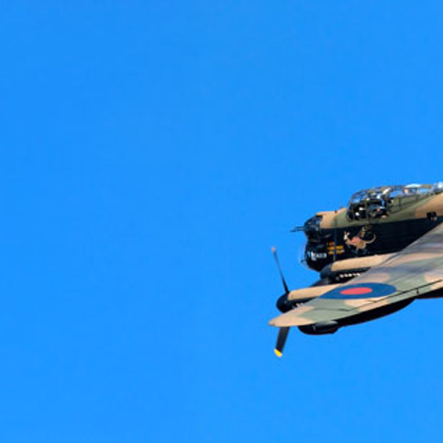 Lancaster Bomber over a blue sky